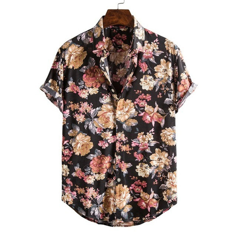Floral patterned shirt on a hanger with a white background